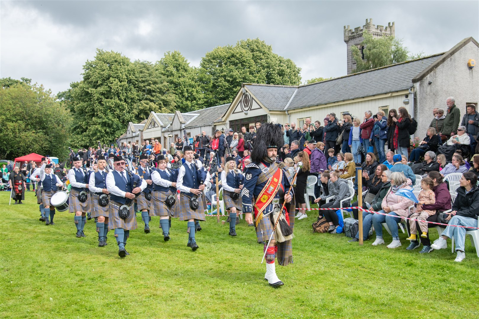 Aberlour Community and District Pipe Band parade in the main arena...The 78th Aberlour Strathspey Highland Games, held at Alice Littler Memorial Park...Picture: Daniel Forsyth..