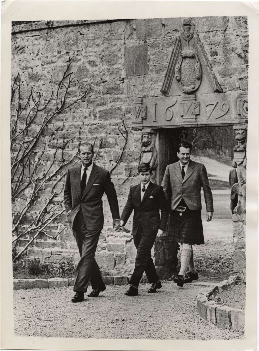 A young Prince Charles and his father the Duke of Edinburgh arriving at Gordonstoun, accompanied by friend Iain Tennant.