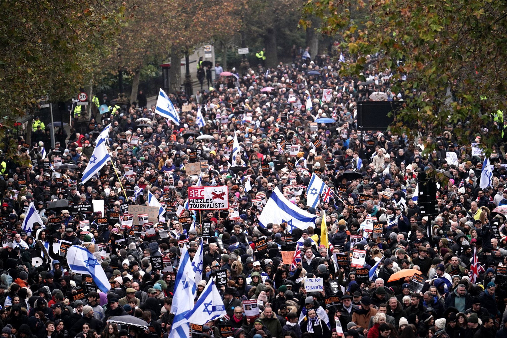 People take part in a march against antisemitism organised by the volunteer-led charity Campaign Against Antisemitism in central London (Jordan Pettitt/PA)