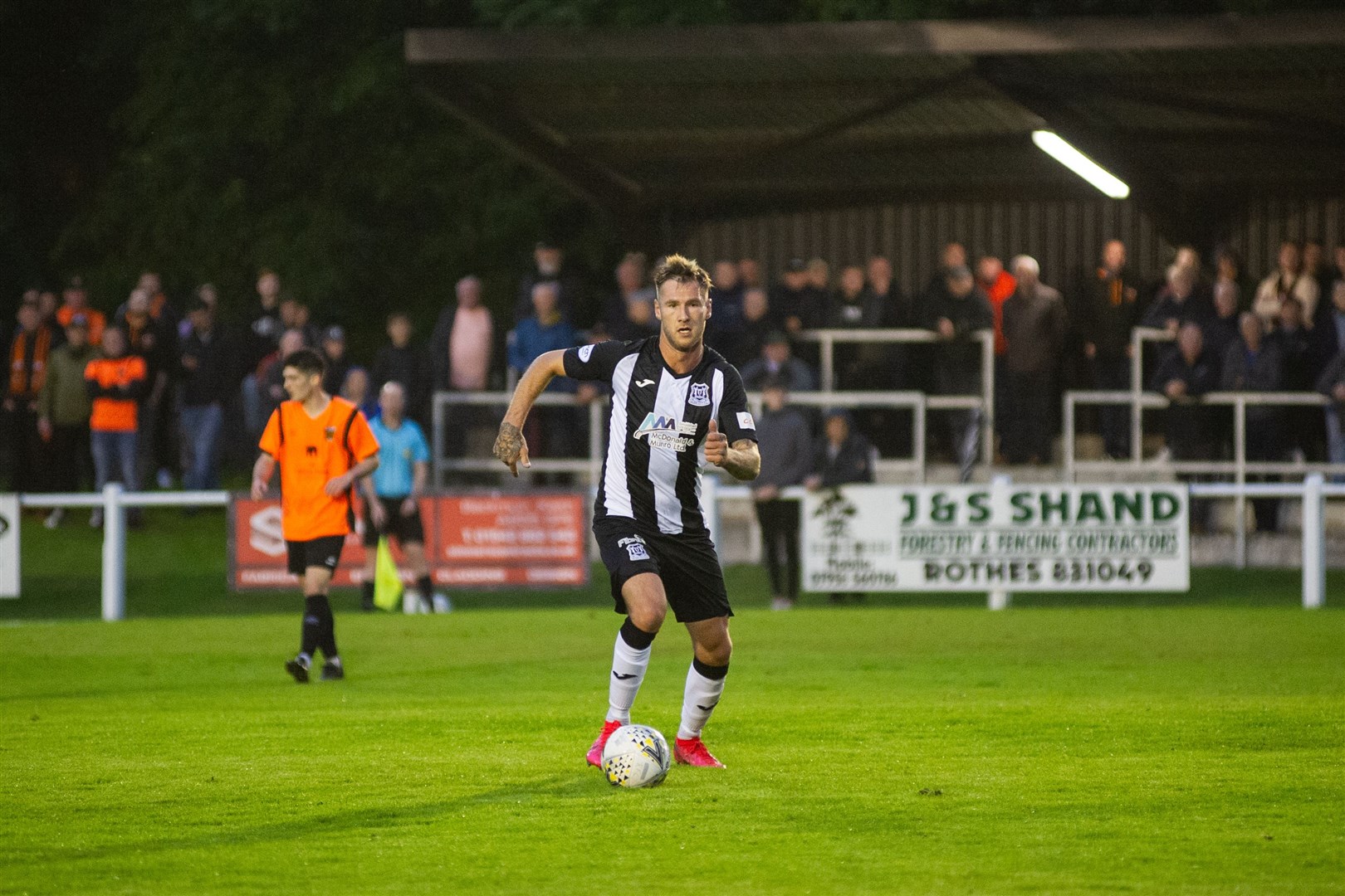 Elgin City's Brian Cameron in front of the home crowd. Picture: Daniel Forsyth....