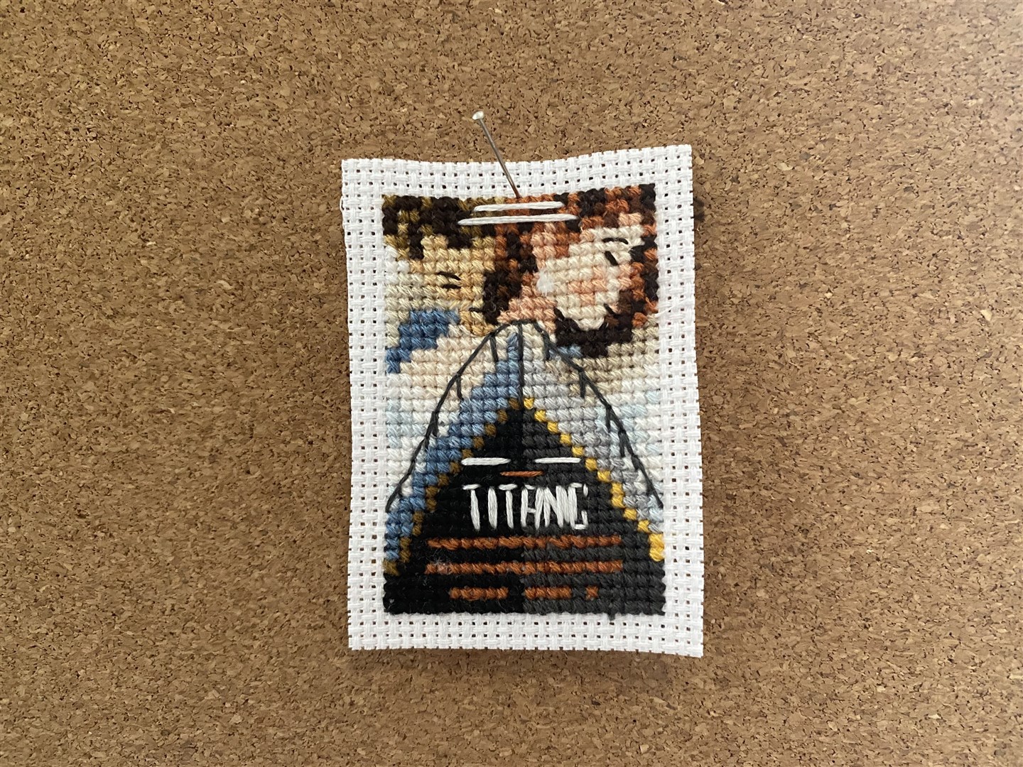 The poster for Titanic in cross-stitch (Victoria McNally/PA)