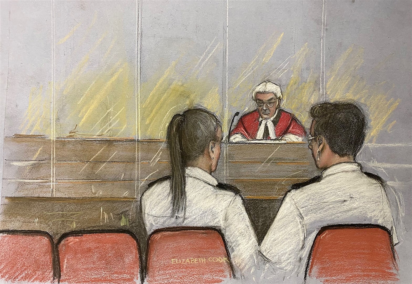 A court sketch of Judge Mr Justice Goss addressing the dock containing two dock officers beside empty seats during the sentencing (Elizabeth Cook/PA)
