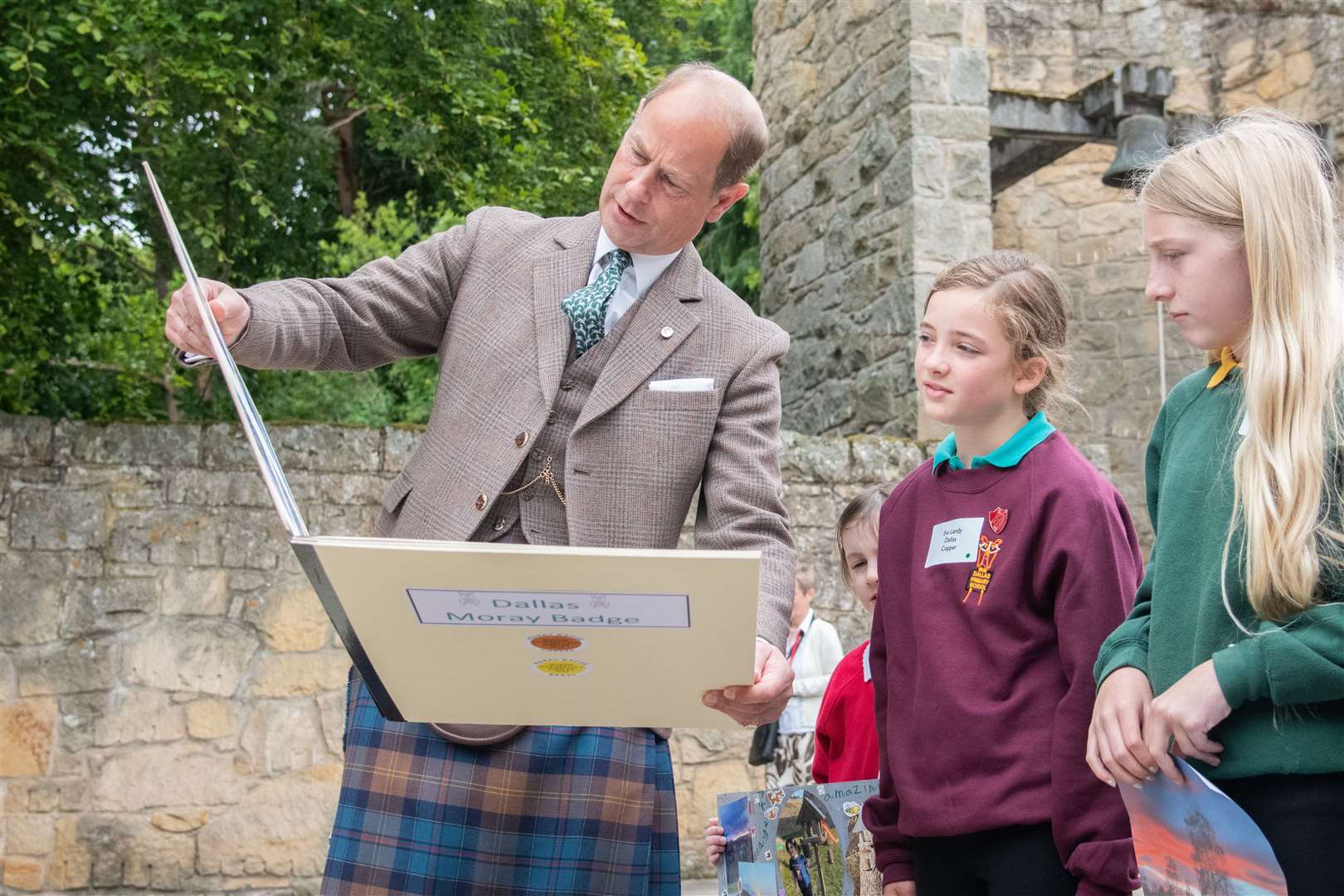 The Prince talks to Eva Landy from Dallas Primary School, as he is greeted on arrival by primary school pupils from Moray...Prince Edward and Sophie, known as the Earl and Countess of Forfar when visiting Scotland, spend time at Gordonstoun School during their visit to Moray...Picture: Daniel Forsyth..