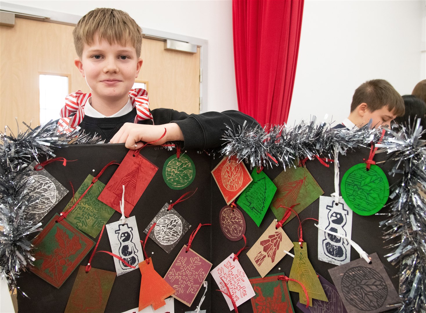 Oscar Combe with some christmas prints. ..Elgin Academy Christmas farmers market...Picture: Daniel Forsyth..