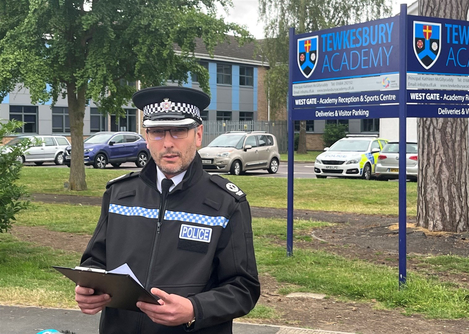 Assistant Chief Constable Richard Ocone, of Gloucestershire Police, reads a statement to reporters outside Tewkesbury Academy in Gloucestershire after the alleged attack (PA)