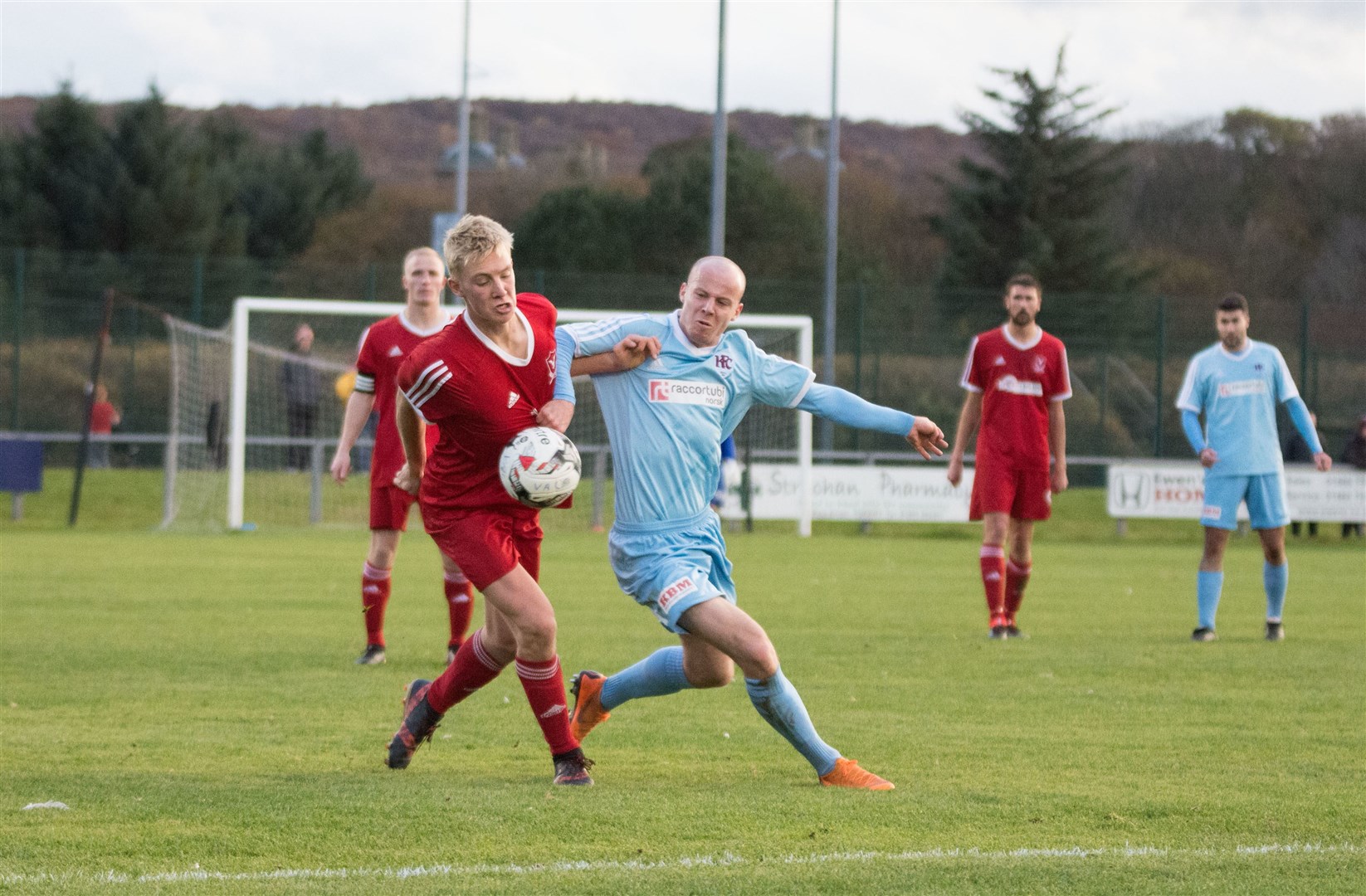 Lewis Dunbar (left) in Deveronvale colours - now the defender has joined Buckie.