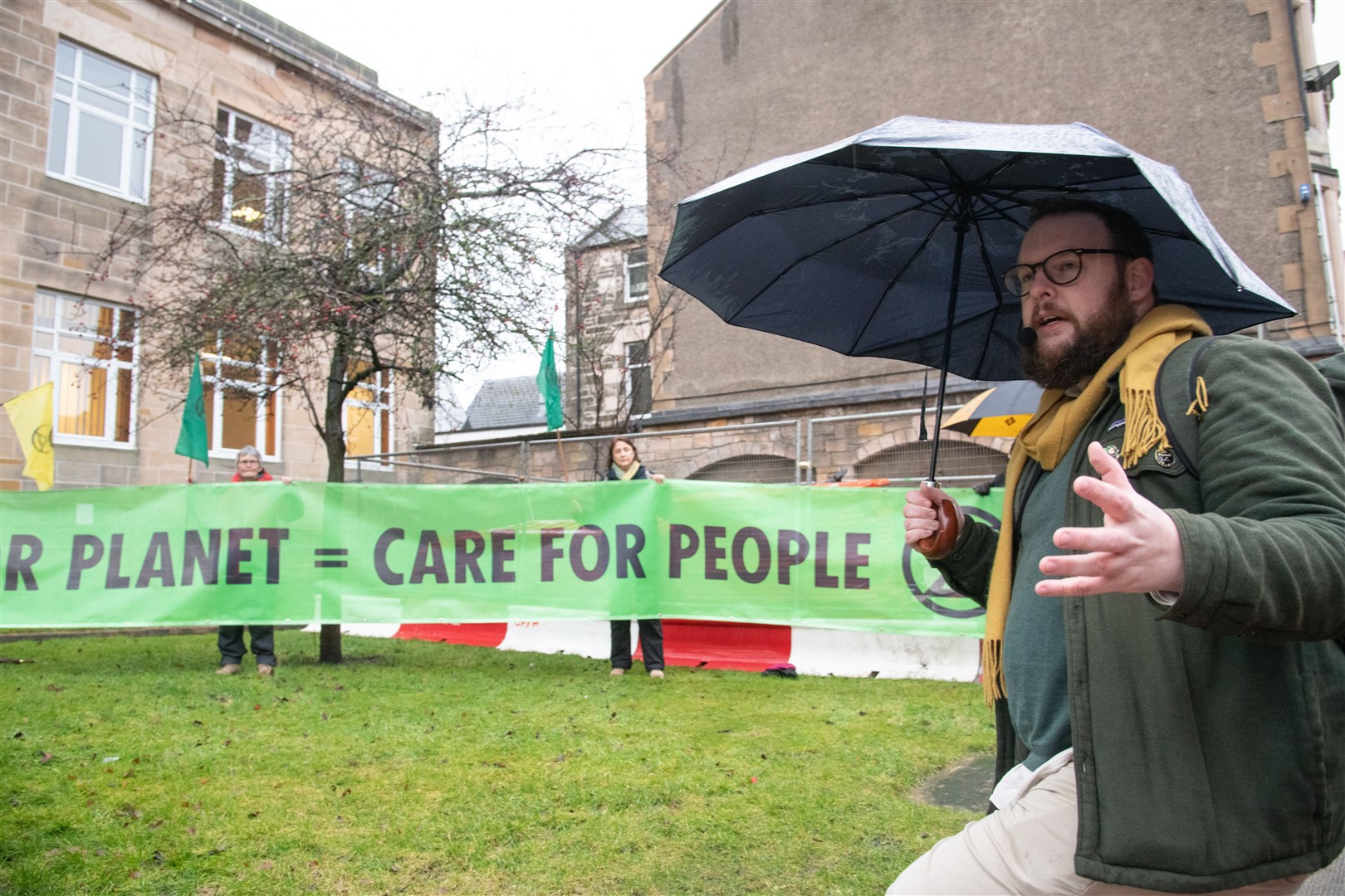 Allan Gray says a few words...Climate activists gather outside the Moray Council HQ ahead of the February's full council meeting. ..Picture: Daniel Forsyth..