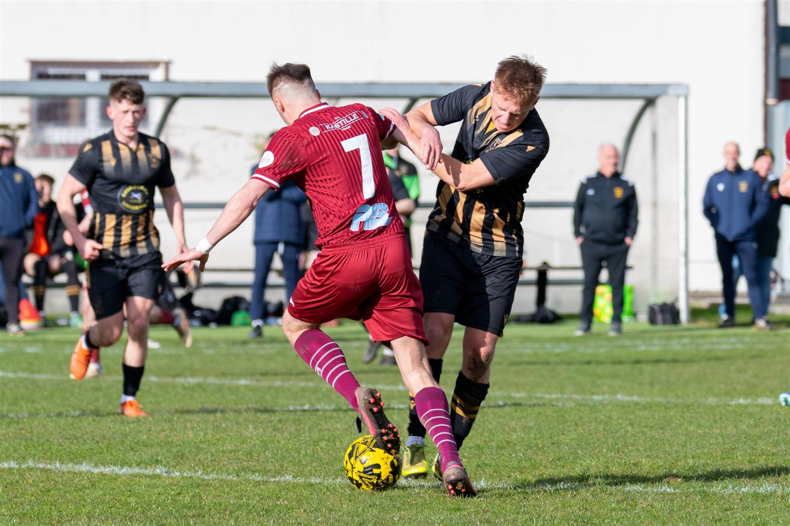 Keith's Gavin Elphinstone makes a successful tackle against Huntly's Ryan Sewell.Keith F.C (1) v Huntly F.C (0) at Kynoch Park, Keith. Highland Football League.Picture: Beth Taylor