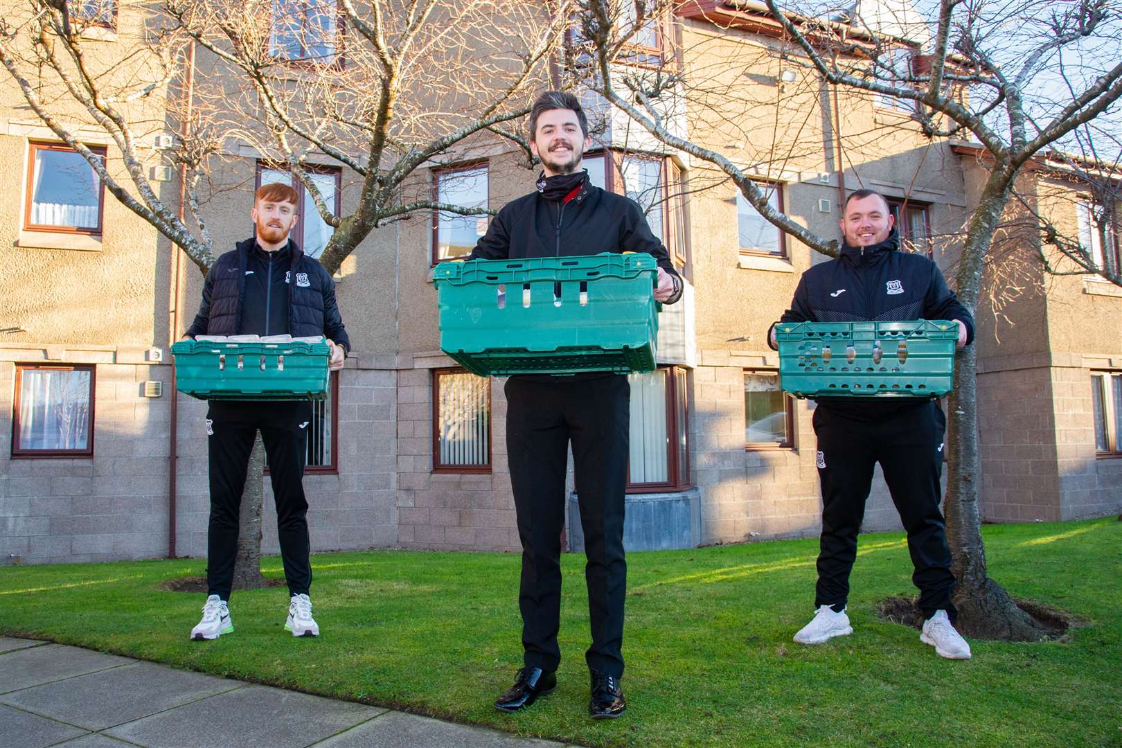 Elgin City trio of Tom McHale, Keiran Carty and Craigh Stewart...Elgin City FC, along with Tesco Elgin and Guidi's in Lossiemouth, hand out 130 three course meals to sheltered housing in the community...Picture: Daniel Forsyth..