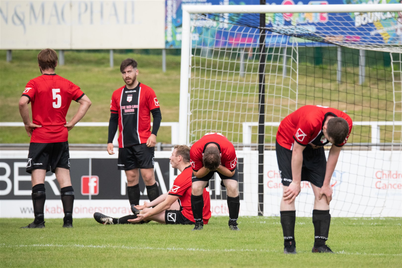 Fochabers think it's all over as they concede a penalty in the final minute of normal time.Picture: Daniel Forsyth