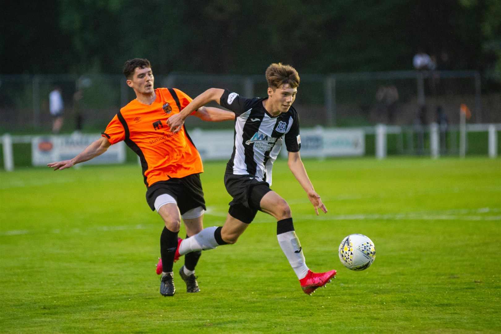 Fin Allen breaks away from Rothes goal hero Jack Brown. Picture: Daniel Forsyth....