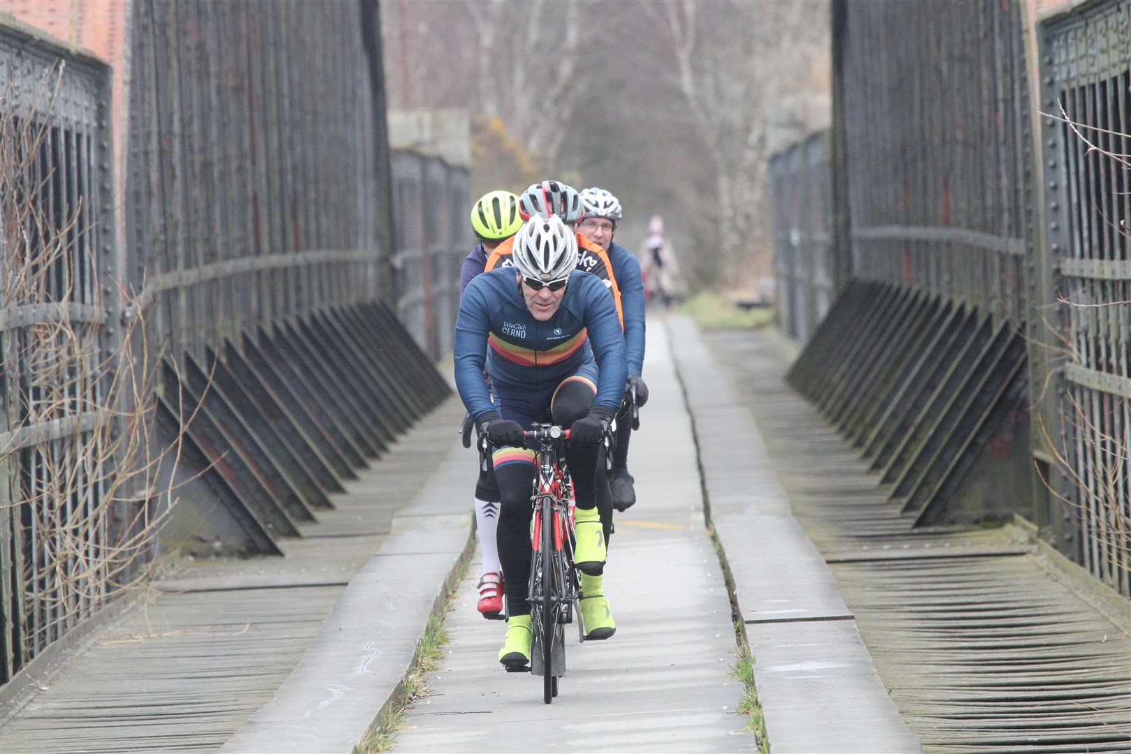 Kevan Sturgeon leads a pack of riders across the Spey Viaduct.