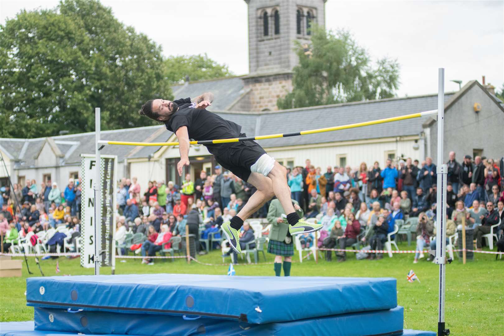 Andy Macdonald jumps over the high jump bar...77th Aberlour Strathspey Highland Games held on Saturday August 6, 2022...Photo: Daniel Forsyth..