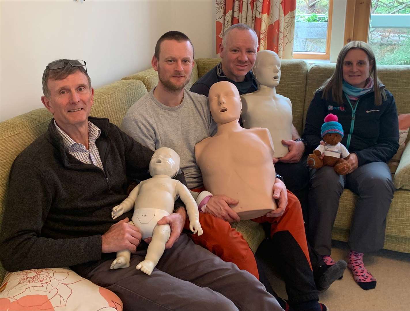Equip Moray First Aid Instructors.  Left to right: Tony Gabb, Andy Woolnough, Chris Morrison, Claire Alldritt (and mascot Belay Bear)