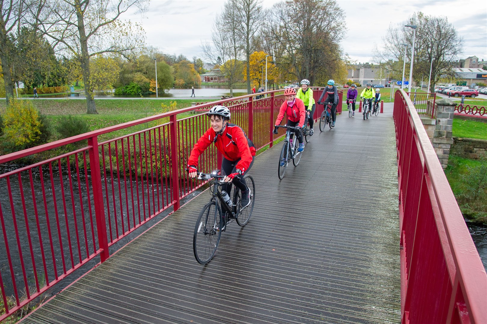A third group of cyclists cross the bridge out of Cooper Park. ..A record number of cyclists from the of the Nairn and Elgin Breeze Groups turn out for a cycle from Elgin Library to Duffus Castle and back. ..Picture: Daniel Forsyth..