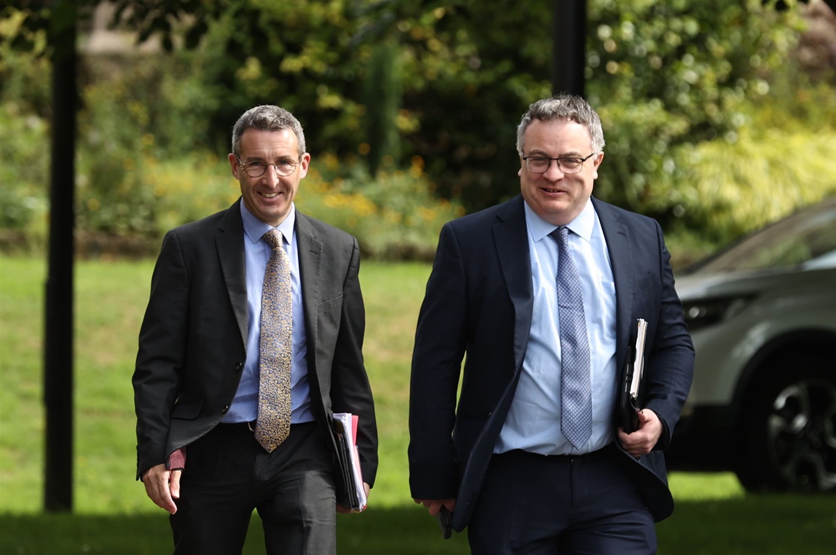 Alliance Party Andrew Muir (left) and Stephen Farry arriving at Stormont Castle in Belfast (Liam McBurney/PA)