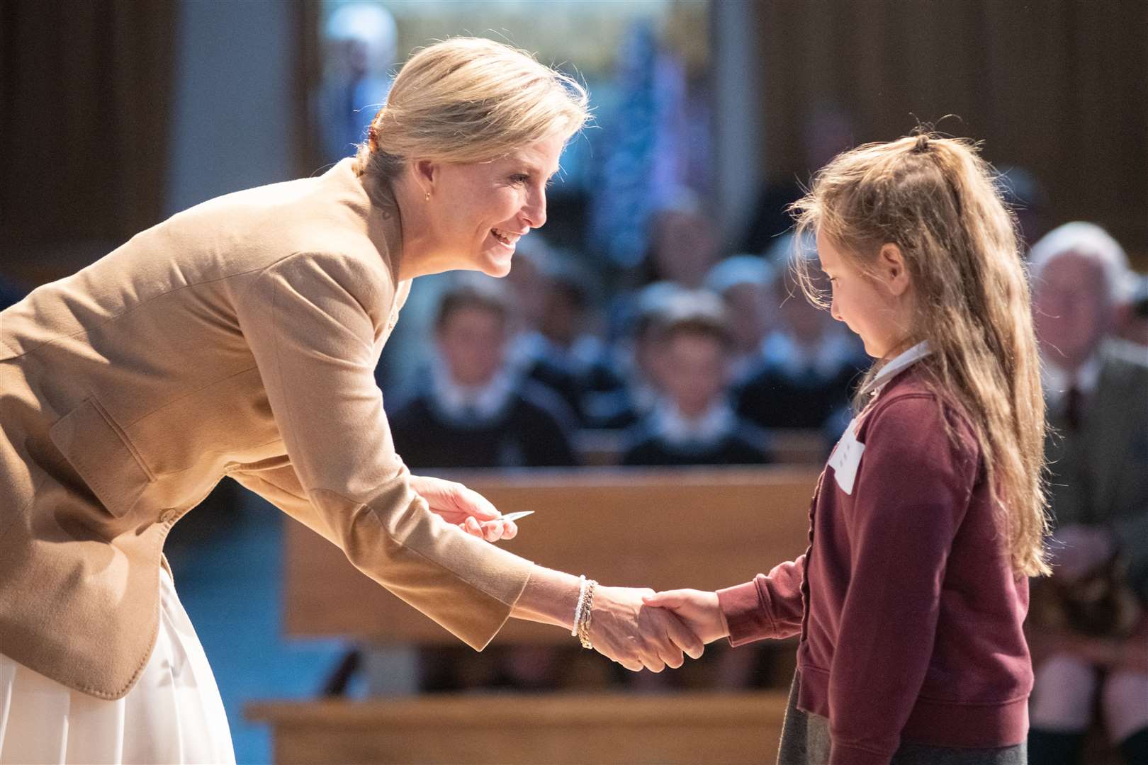 The Countess of Forfar hands out a badge a Mosstowie Primary School pupil...Prince Edward and Sophie, known as the Earl and Countess of Forfar when visiting Scotland, spend time at Gordonstoun School during their visit to Moray...Picture: Daniel Forsyth..