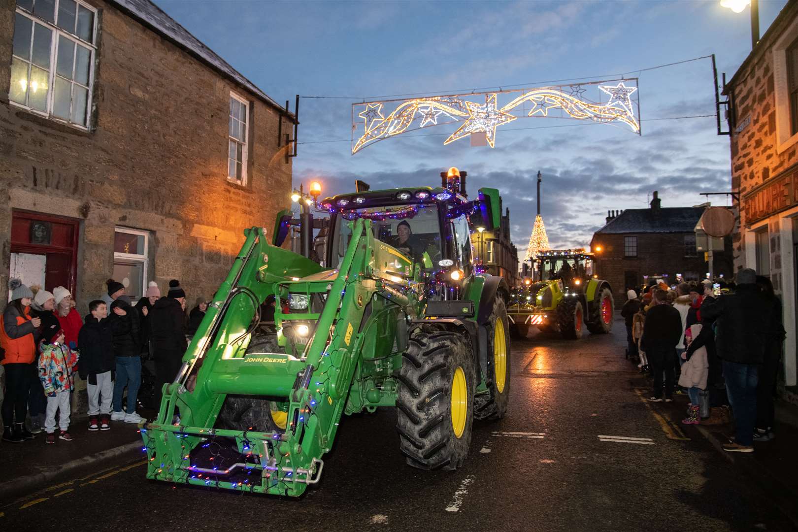 The festive tractor and lorry run make their way through the crowds. Picture: Daniel Forsyth