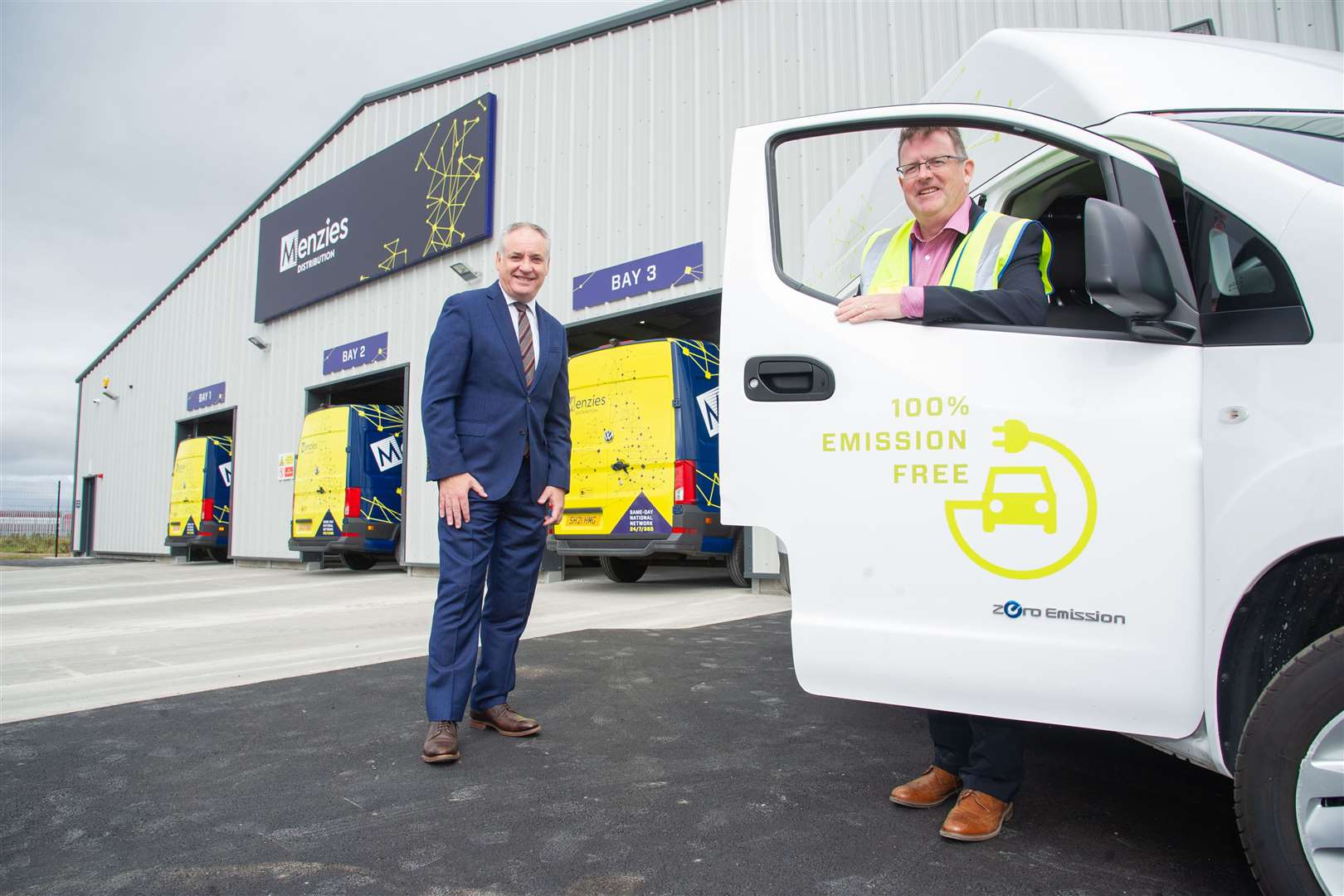 Moray MSP Richard Lochhead is joined by Menzies parcels operations director Stephen Mooney at the official opening of the new Menzies Distribution centre at Elgin Business Park. Picture: Daniel Forsyth.