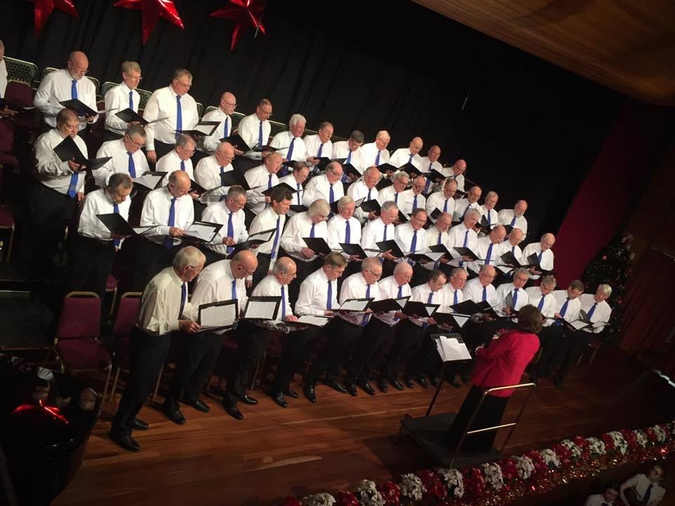 Performing under the baton of musical director Jane Ferguson is the Glen Moray Male Voice Choir.