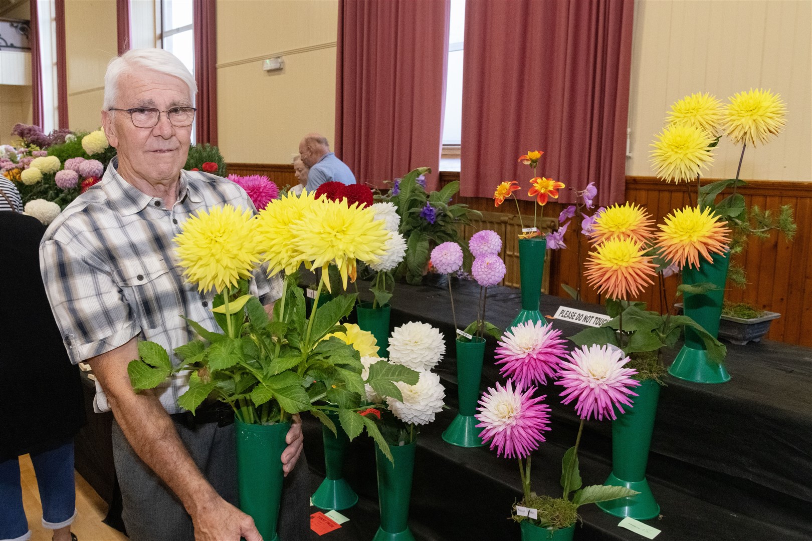 Dufftown Horticultural Society president Chris Mutter with his dahlias. Picture: Beth Taylor