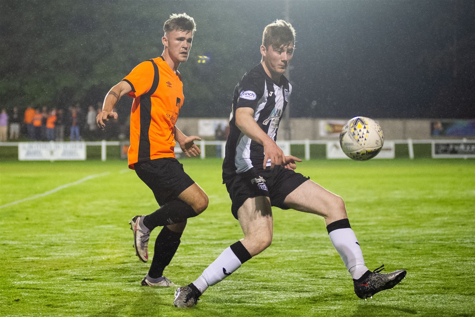 Elgin City's Ben Cormack shields the ball from Rothes' Shane Harkness. Picture: Daniel Forsyth....