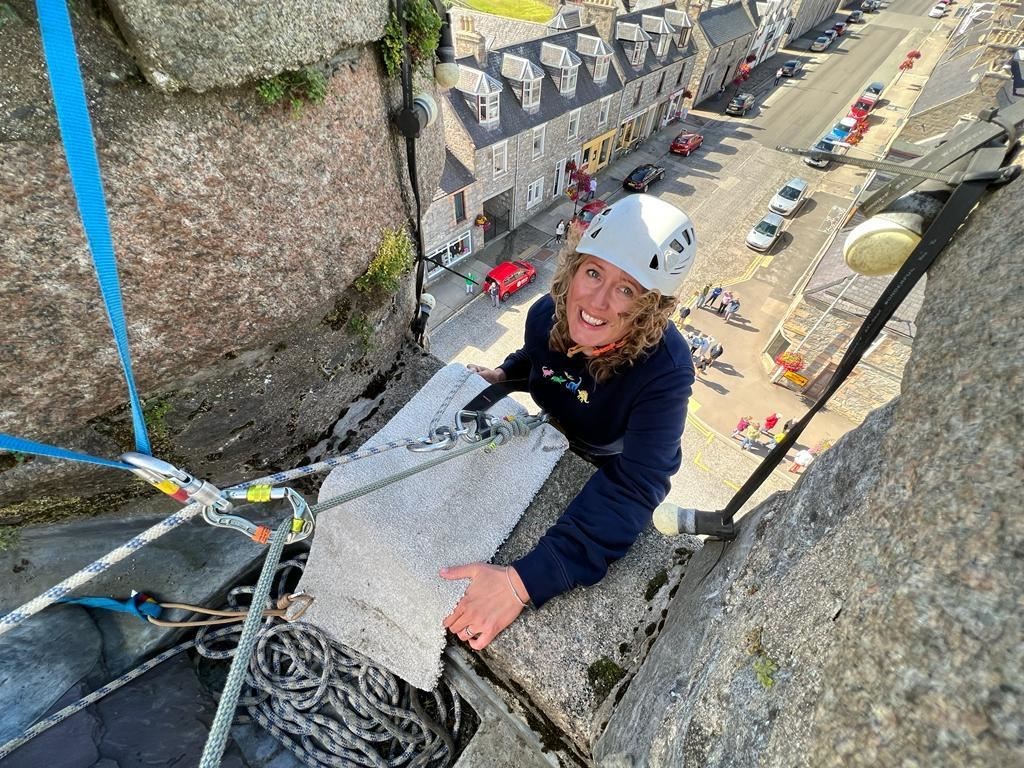 Anna Vince taking part in the abseil at Dufftown Clock Tower.