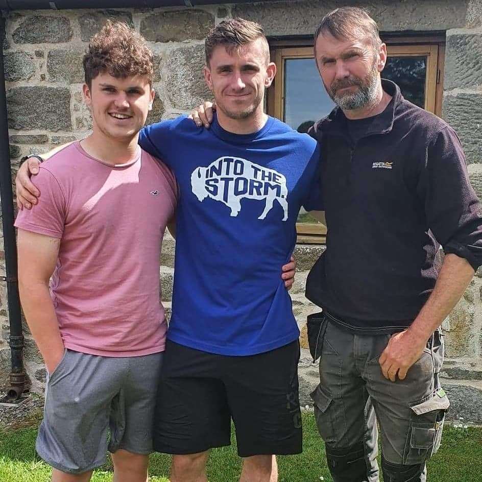 Rob (left) with bother Johnny and dad Ed.