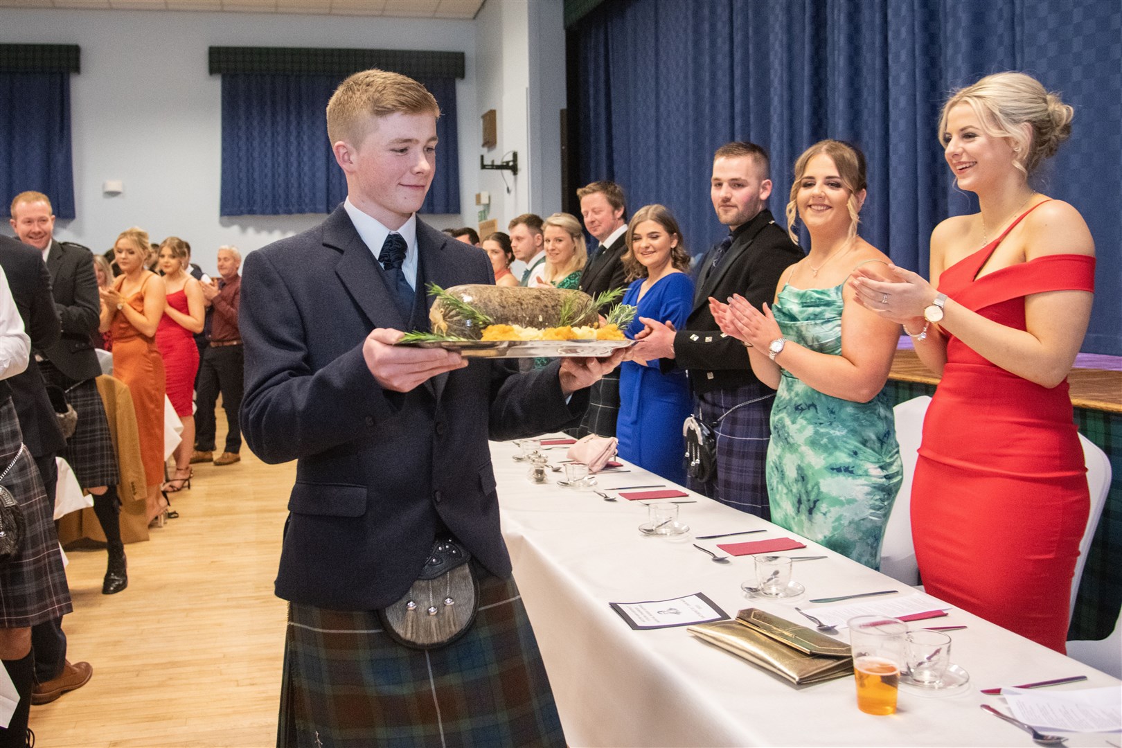 Mitchell McGillivray carries the haggis in. ..Keith Young Farmer Burns Supper 2023, held at the Longmore Hall. ..Picture: Daniel Forsyth..