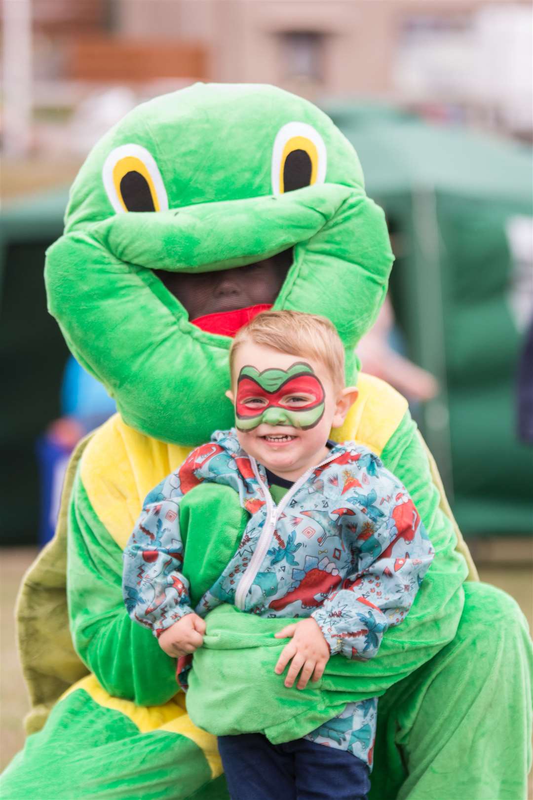 Michelangelo with Alex Mitchell at Logan's Family Fun Day last year.