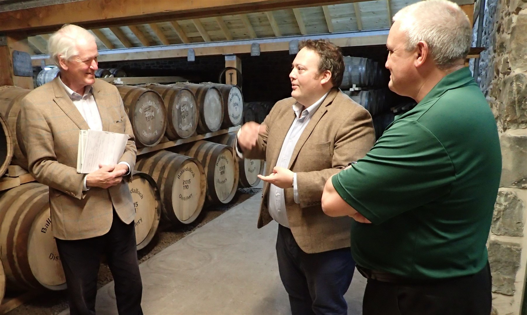 Jamie Halcro Johnston MSP (centre) with Oliver Russell (left) and Davey Norquoy at Ballindalloch Distillery.