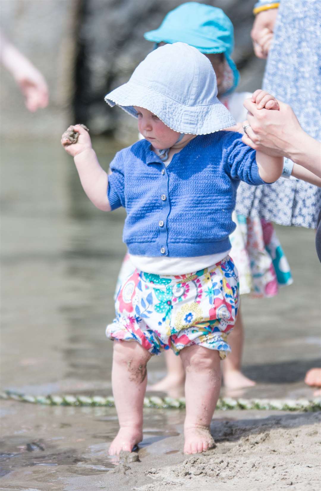 Dipping the toes in the water on a sun-kissed festival afternoon. Picture: Becky Saunderson