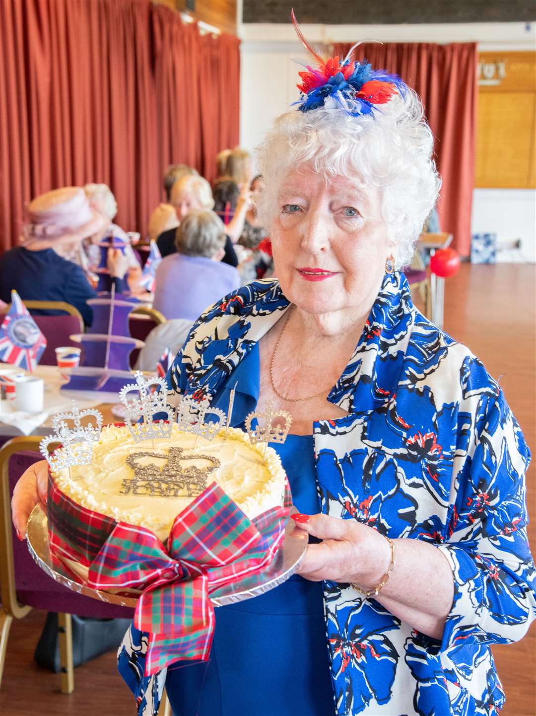 Maureen Menzies shows off the Jubilee cake she made for the occasion. Picture: Daniel Forsyth