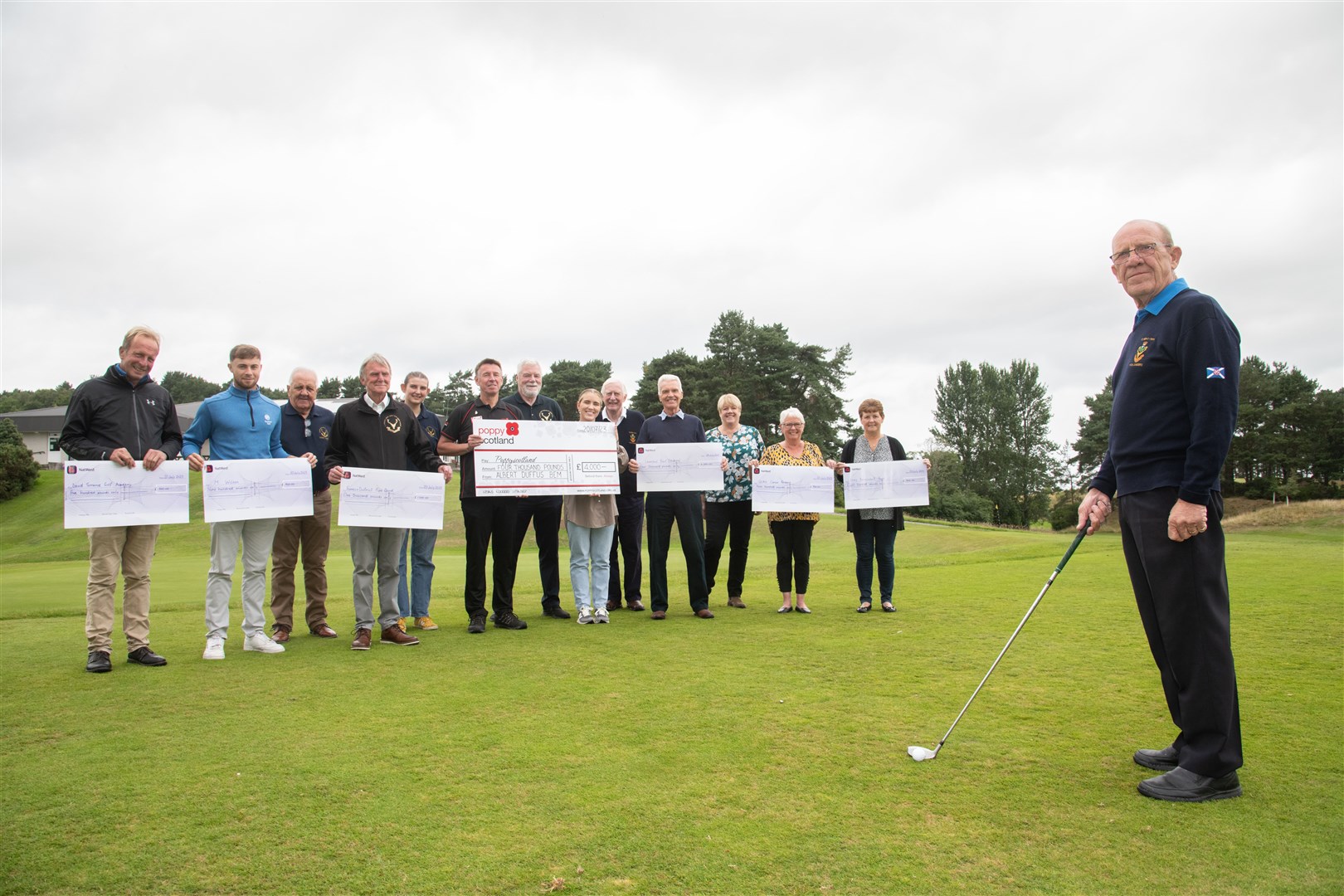 Organiser Albert Duffus (right) with representatives of the groups to benefit from the charity golf day. Picture: Daniel Forsyth