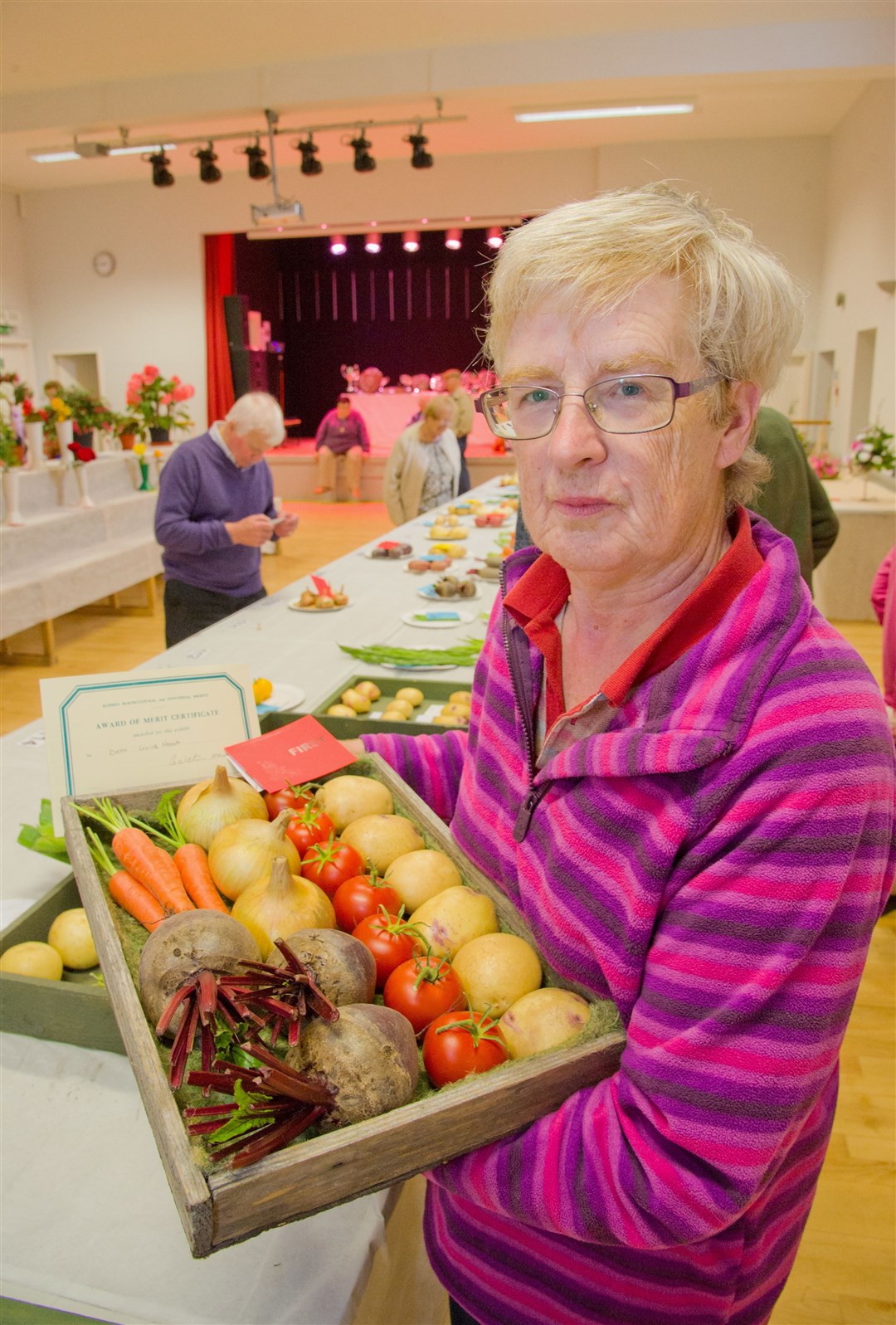 President Dena Cruickshank, pictured with her box of vegetables at last year's show, is urging exhibitors to make the 2019 showcase one to remember. Picture: Daniel Forsyth. Image No.041942.