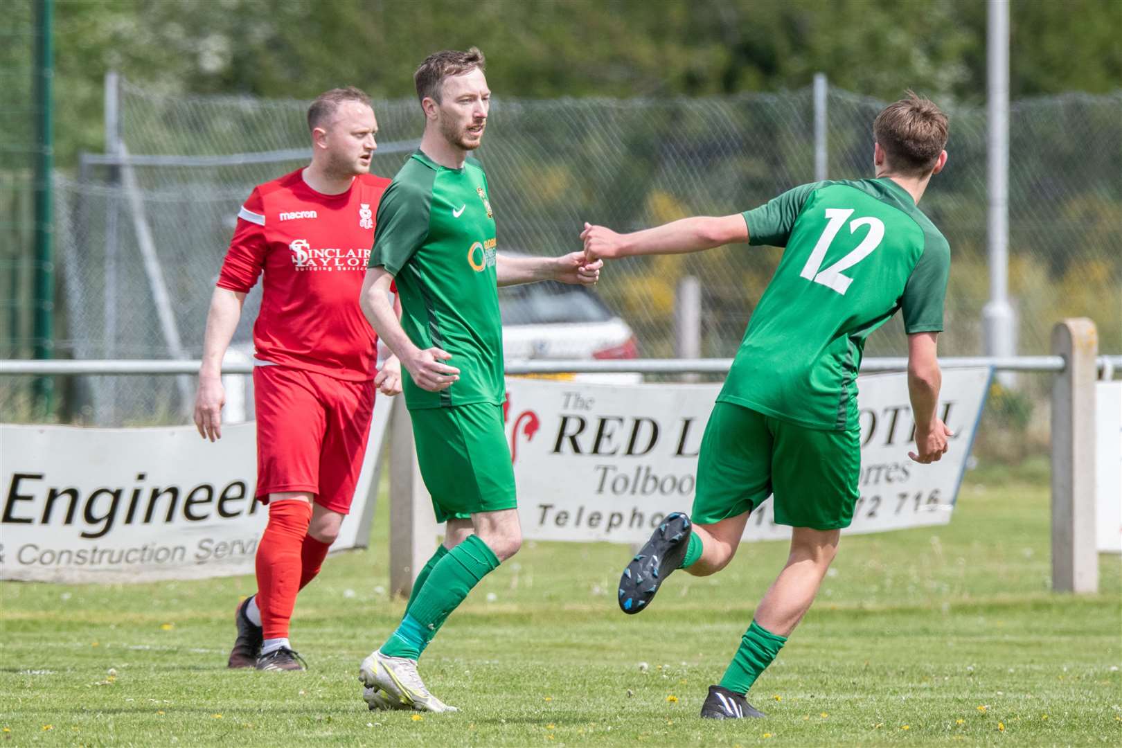 Dufftown's Ben Cullen wheels away to celebrate the opening goal. ..Dufftown FC (2) vs Forres Thistle FC (2) - Dufftown FC win 5-3 on penalties - Elginshire Cup Final held at Logie Park, Forres 14/05/2022...Picture: Daniel Forsyth..