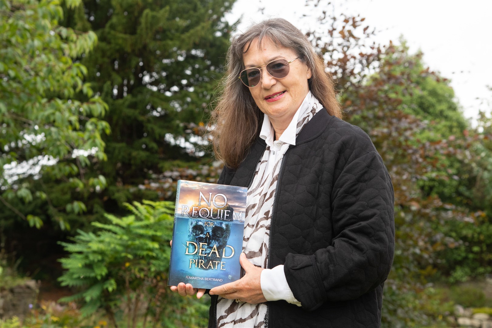 Martha Bertrand with her book 'No Requiem for a Dead Pirate'...Picture: Daniel Forsyth..