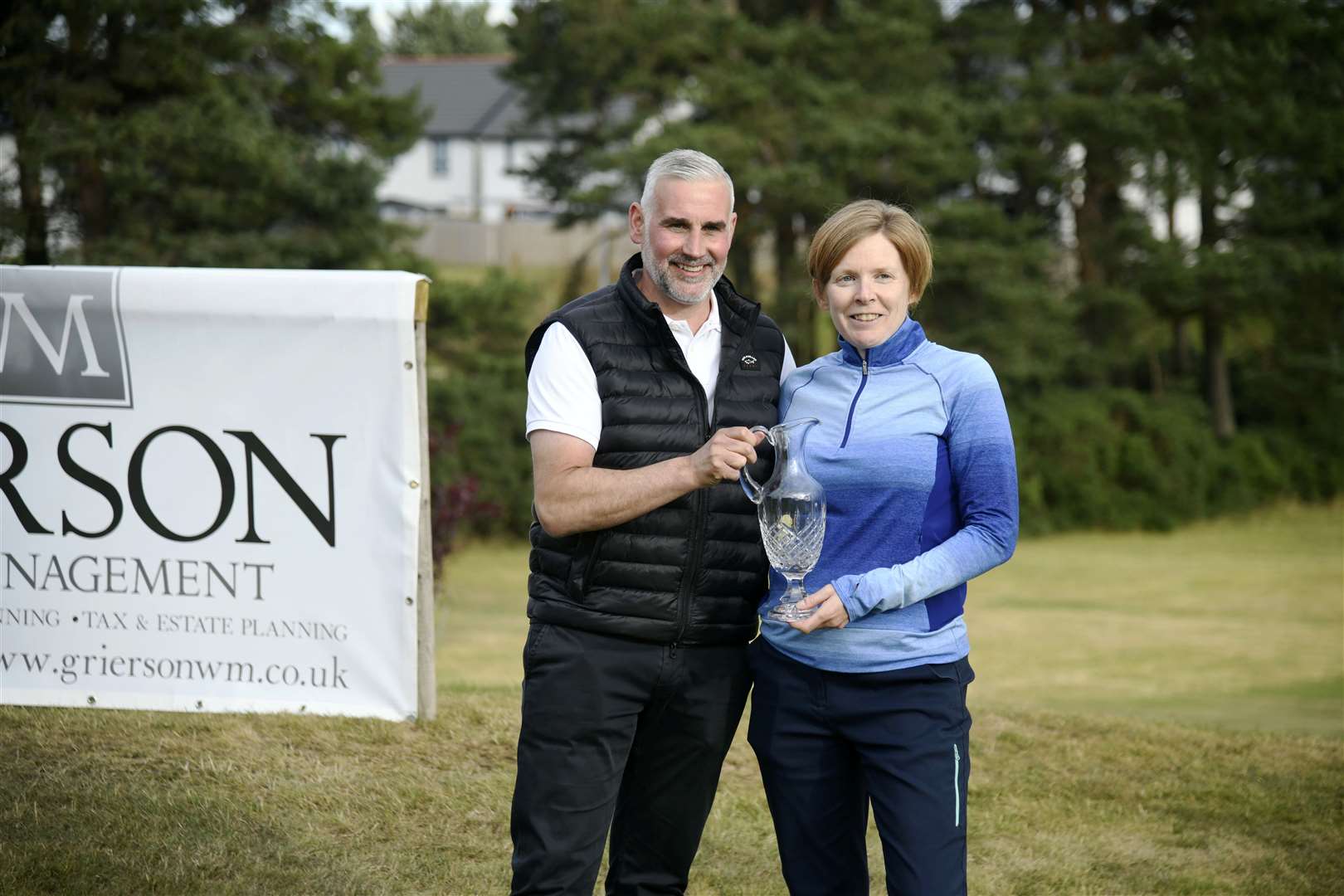 Shona Leese being presented with her trophy, The Ladies Scratch Trophy, by Martin Grierson...Elgin Five Day Open 2022...Picture: Beth Taylor.