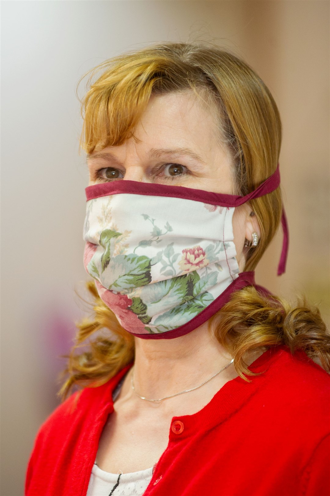 Maureen Halkett, owner of Unique Ladieswear in Lossiemouth, is co-leading a hardworking volunteer team as part of Moray Scrubs' co-ordinated effort. The group are now making masks as well as scrubs. Picture: Daniel Forsyth.