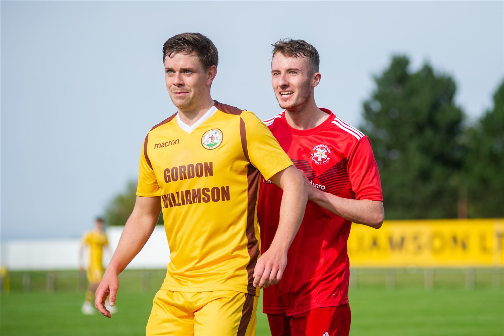 Forres Mechanics' Allan Macphee and Lossiemouth's Ross Morrison...Forres Mechanics FC (1) vs Lossiemouth FC (0) - Highland Football League - Mosset Park, Forres 28/08/2021...Picture: Daniel Forsyth..