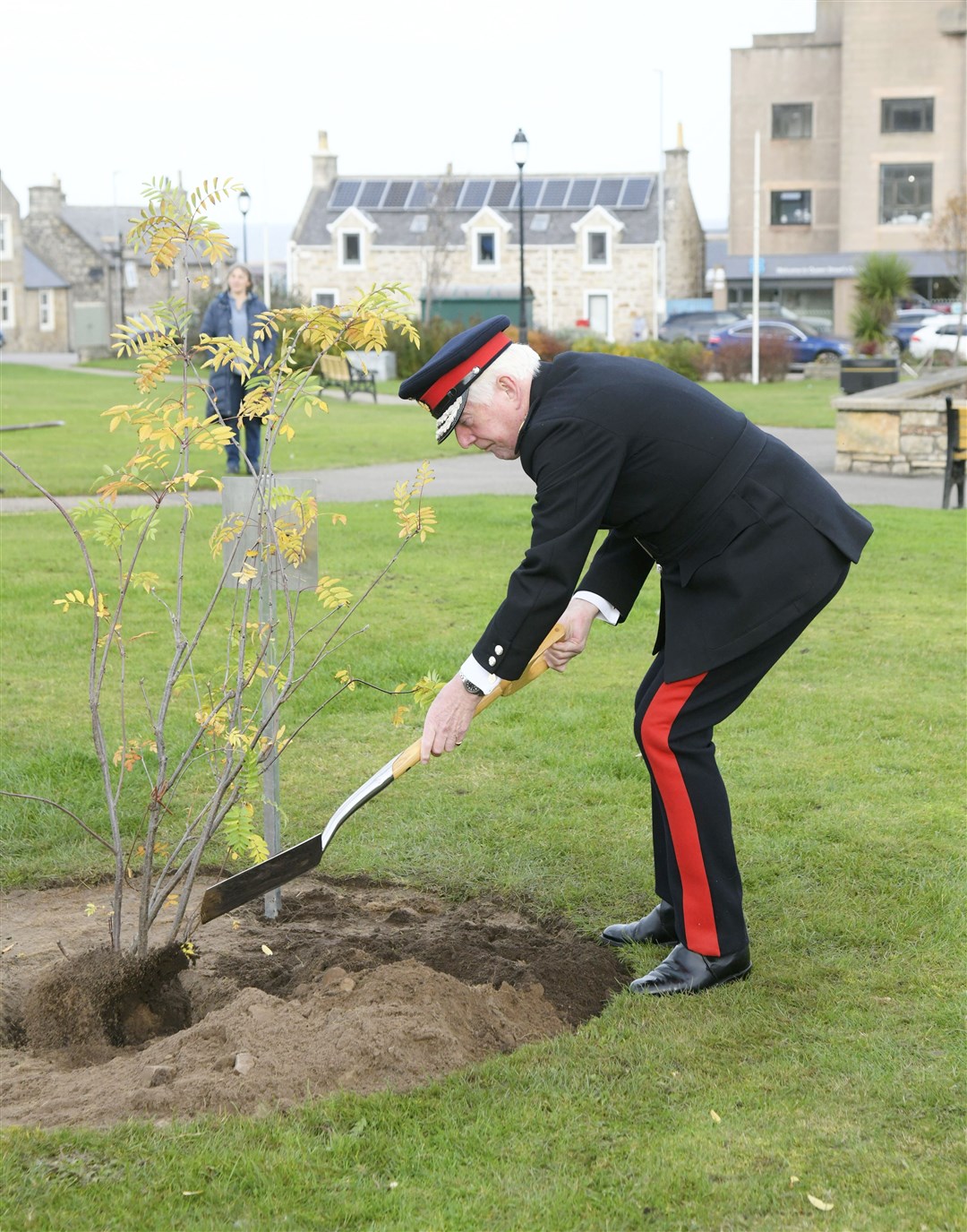 The Lord Lieutenant of Moray Seymour Monro plants the "Tree of Trees" from Buckingham Palace. Picture: Beth Taylor