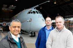 Stan Barber (left), Mark Mair (centre) and Tony Rodger with the Nimrod they hope to save.