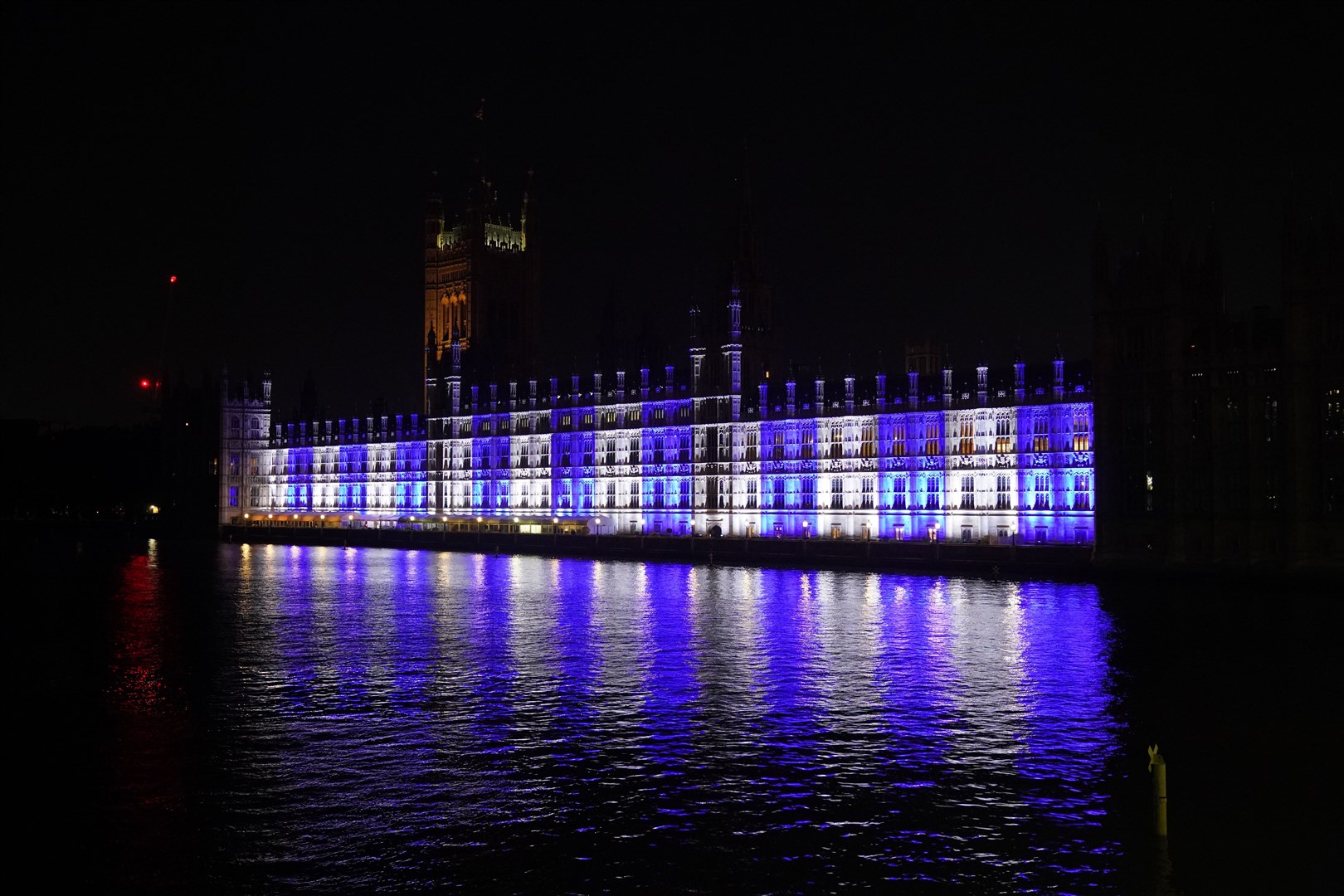 The Palace of Westminster is lit up in the colours of Israel’s flag for victims and hostages of Hamas attacks (Lucy North/PA)