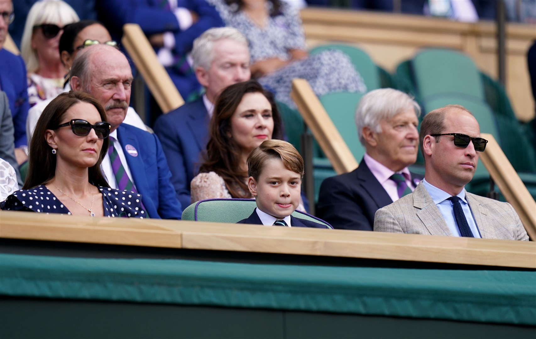 The Duke and Duchess of Cambridge with Prince George in the Royal Box at Wimbledon during the men’s final (Adam Davy/PA)