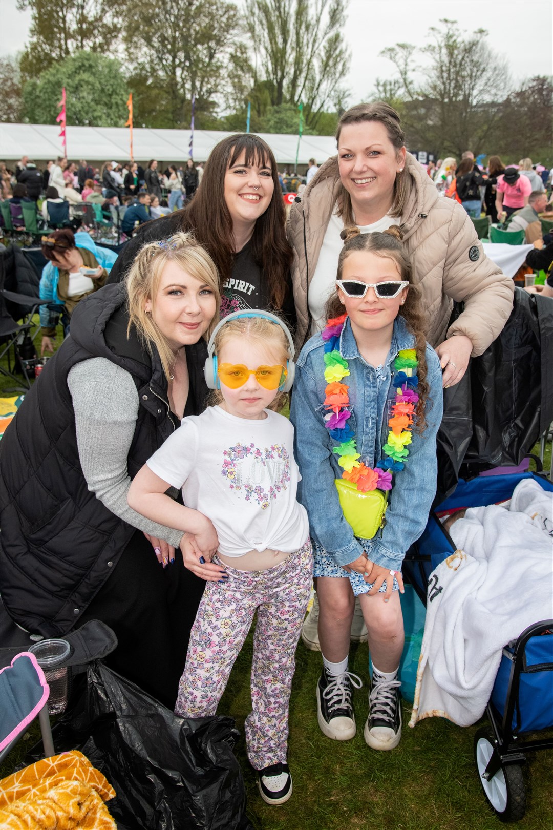 Sarah Anderson (left) with family and friends during the Sunday of the festival. MacMoray Music Festival 2024, held at Cooper Park, Elgin. Picture: Daniel Forsyth.