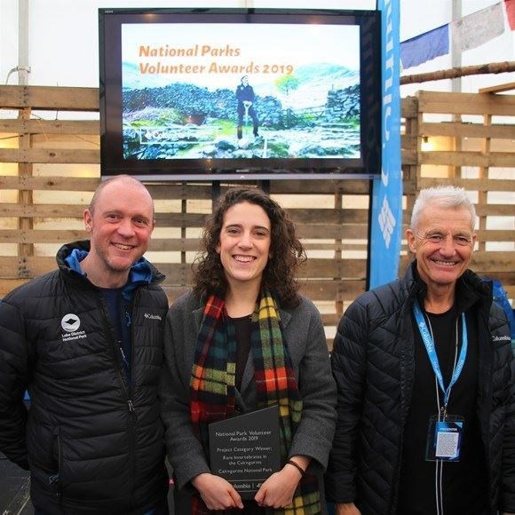 Gabrielle Flinn from the winning RIC project is flanked by Richard Leafe of the Lake District National Park Authority and TV presenter Paul Rose.