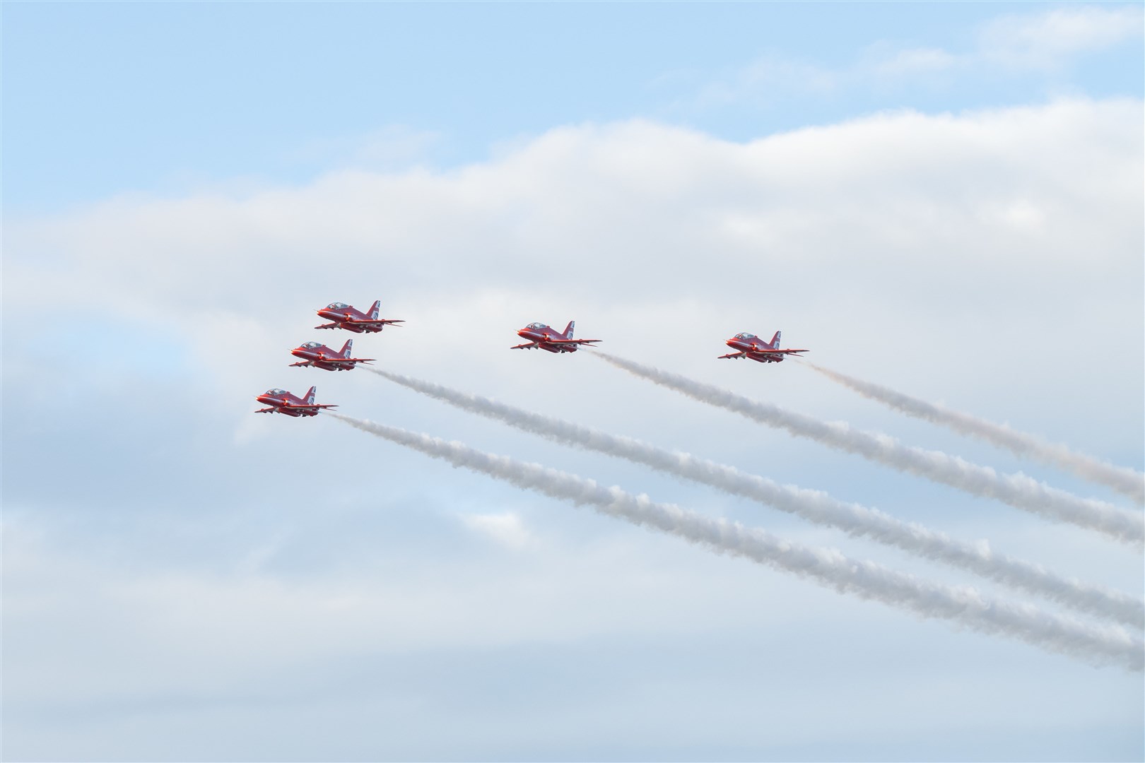 The Red Arrows arrive back to RAF Lossiemouth from Tain for a practice session. ..Picture: Beth Taylor.