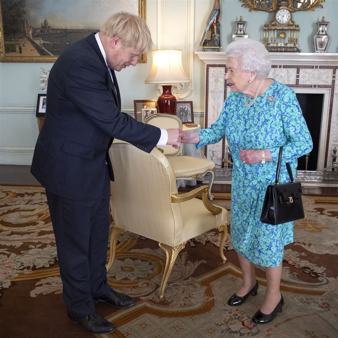 Queen Elizabeth II welcoming Boris Johnson during an audience in Buckingham Palace (Victoria Jones/PA)