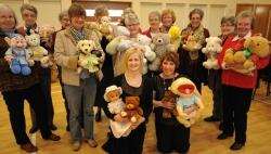 Lorraine Smith and Linda Kay (front left and right), of ‘The Northern Scot’, make sure these teddy bears are given a loving home by presenting them to members of the Moray West Presbyterial Council of the Church of Scotland Guild for onward transportation