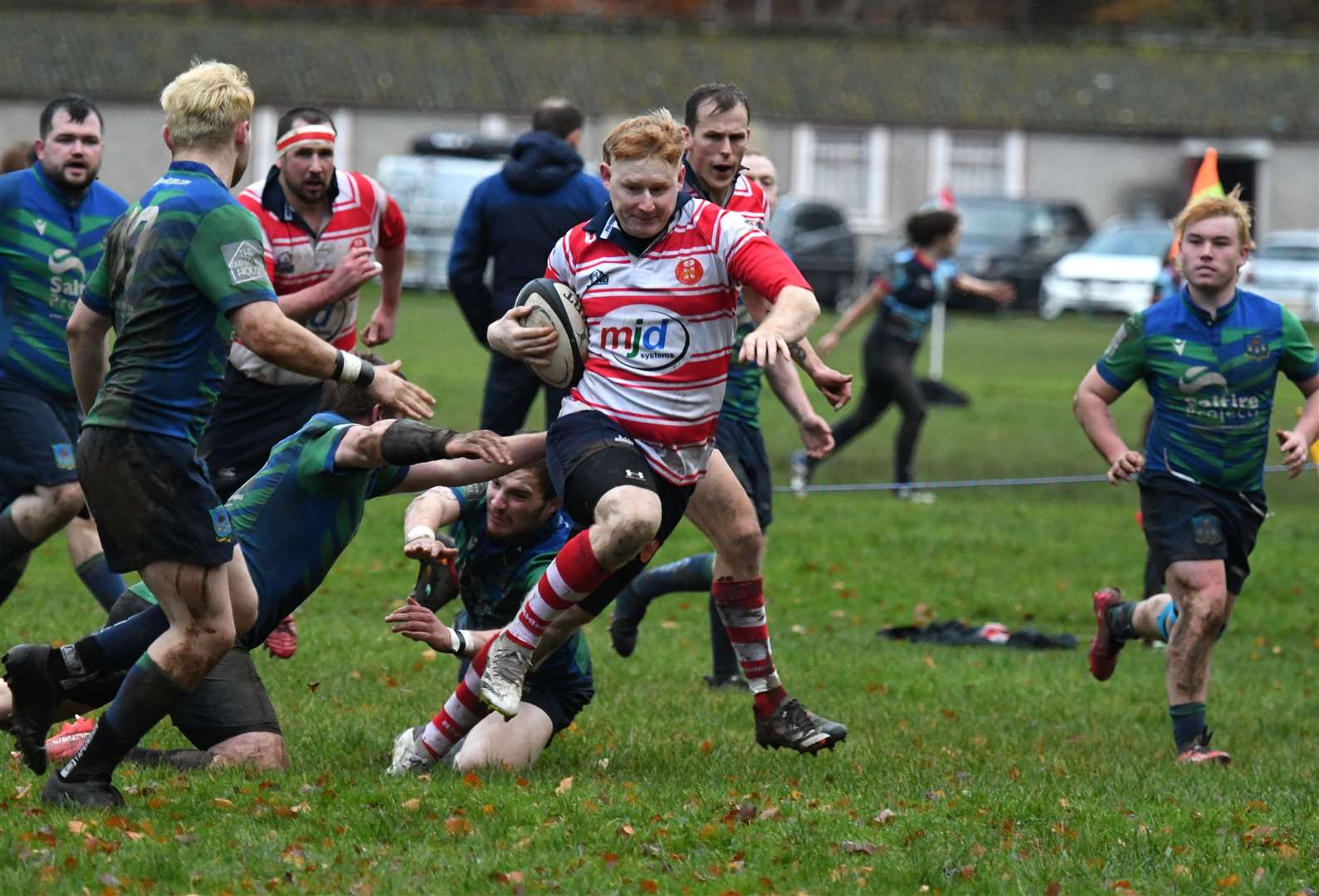 Ewan Simpson leaves tacklers grasping at air. Picture James Officer